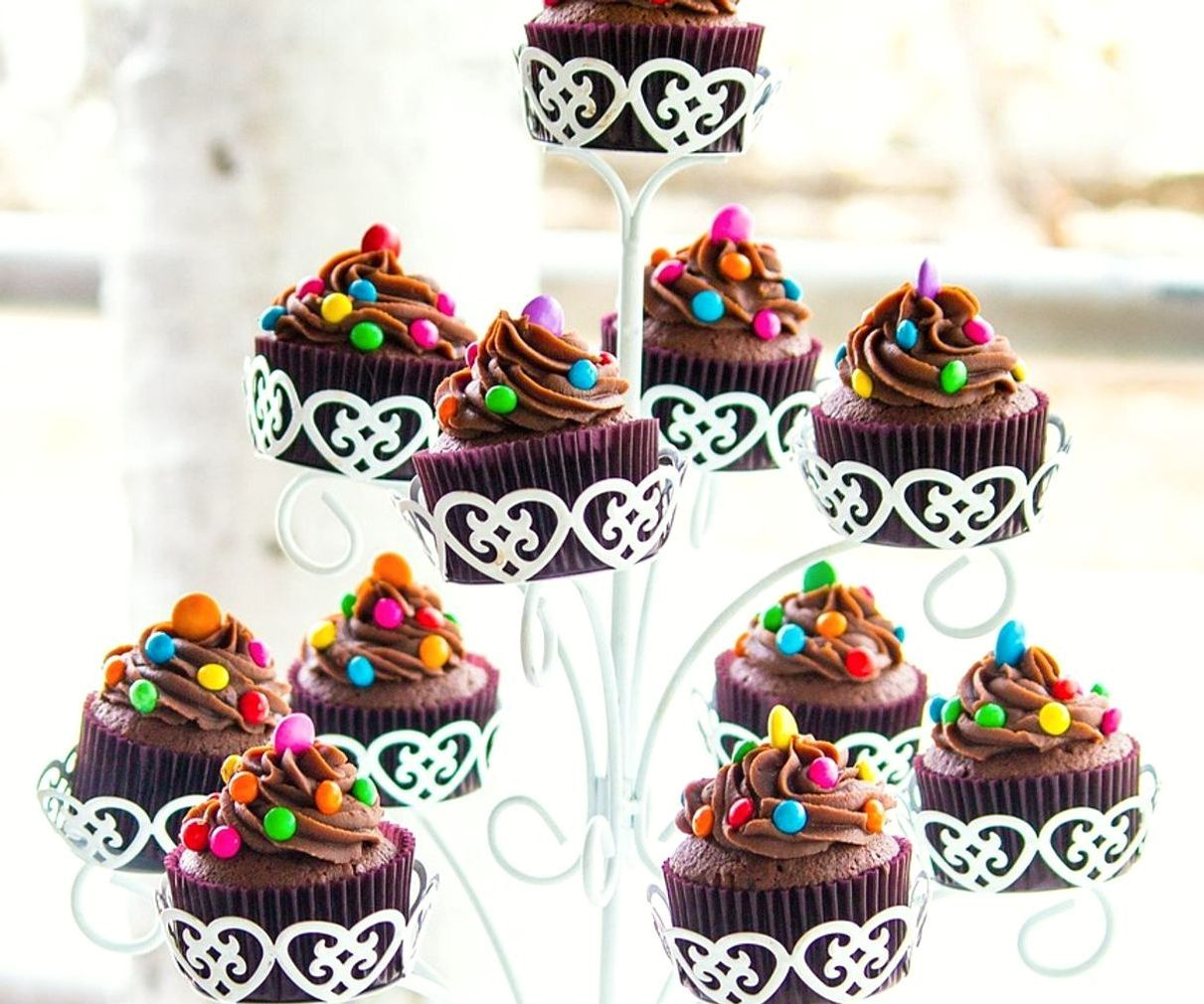 Artisan hands crafting chocolate moulds and confectionery